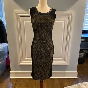 Black color blocked tweed dress. Back zipper leather neckline